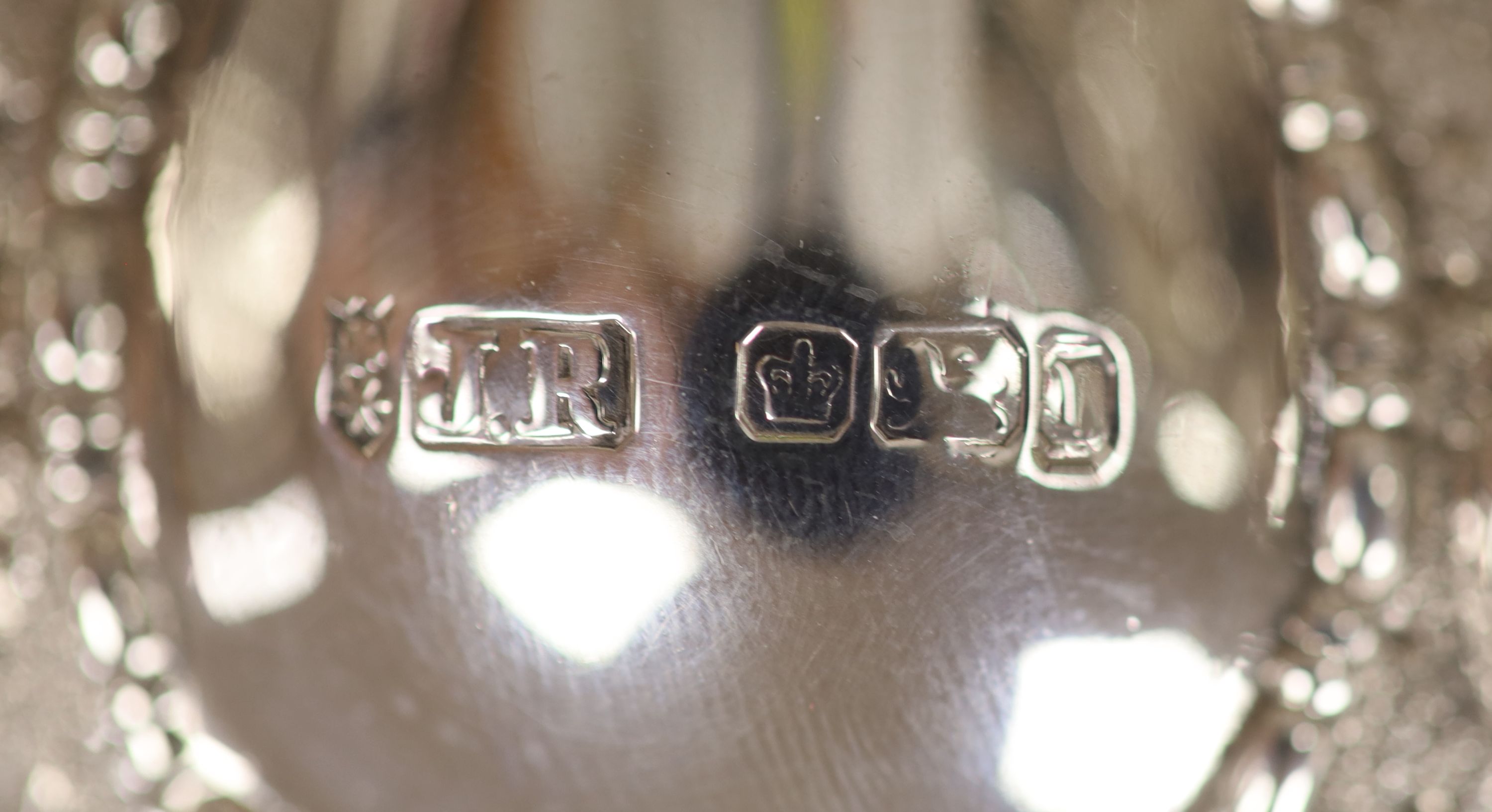 An Edwardian embossed silver fruit basket, Joseph Rodgers & Sons, Sheffield, 1903, 28cm,